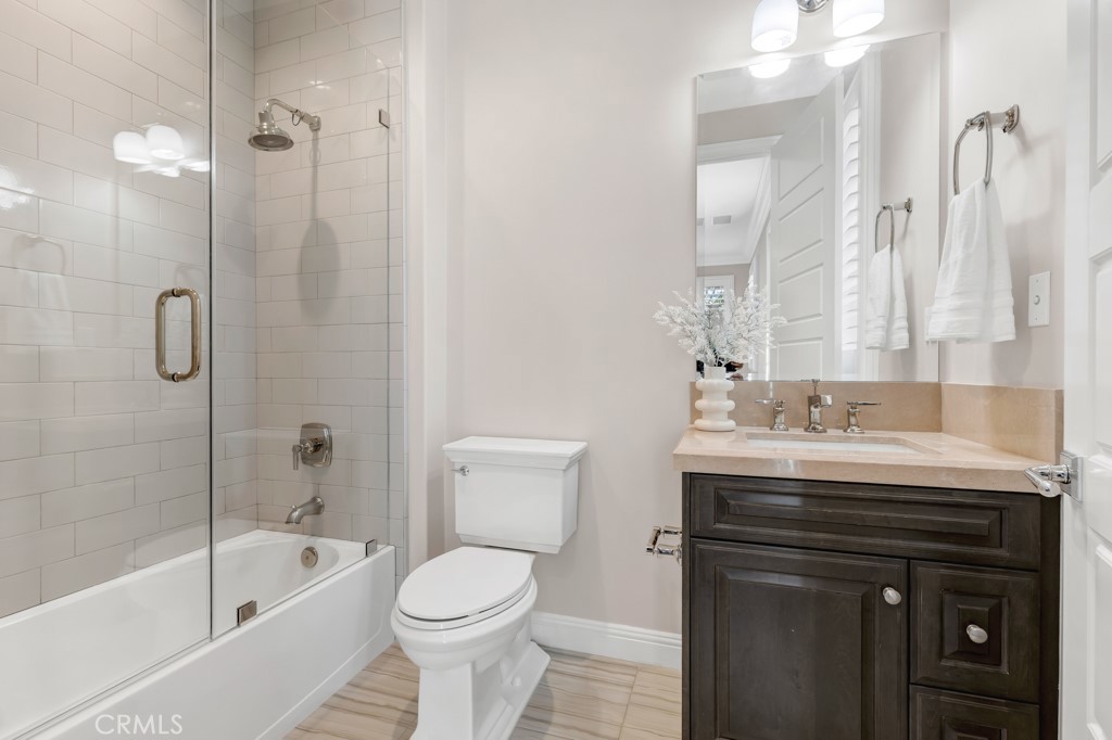 20120 Jubilee Way Porter Ranch, CA 91326 - Photo 40 of 55 a bathroom with a sink a toilet and a bathtub