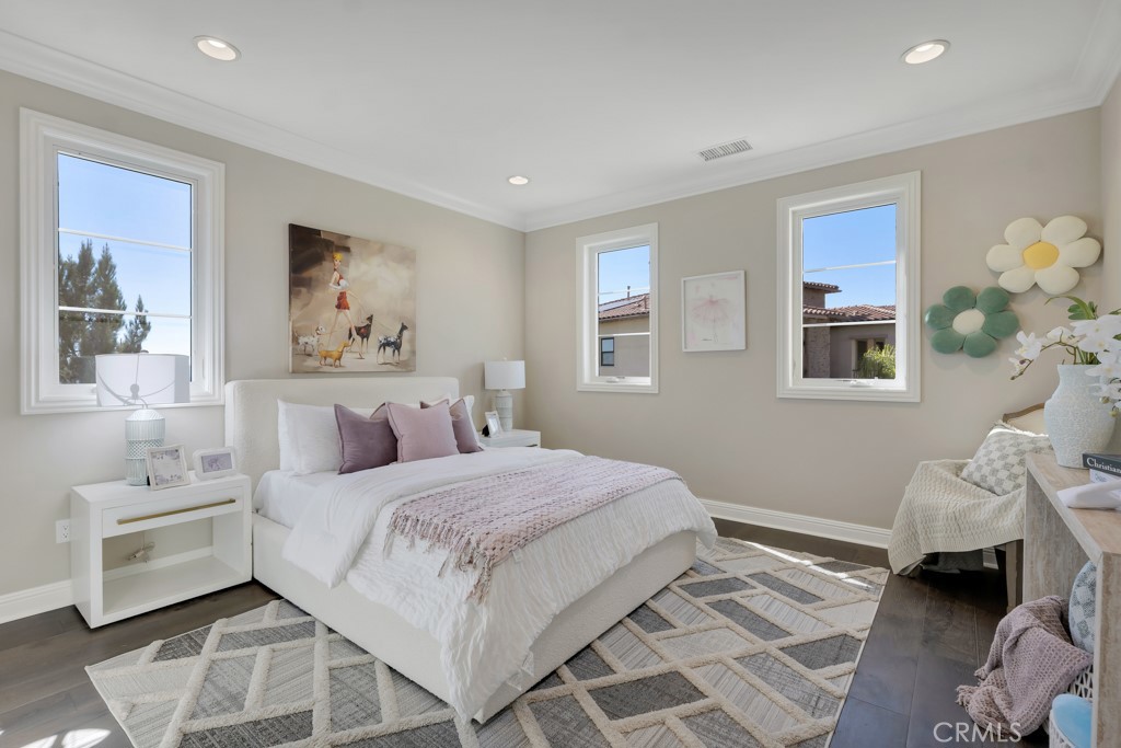 20120 Jubilee Way Porter Ranch, CA 91326 - Photo 41 of 55 a bedroom with a bed and a window
