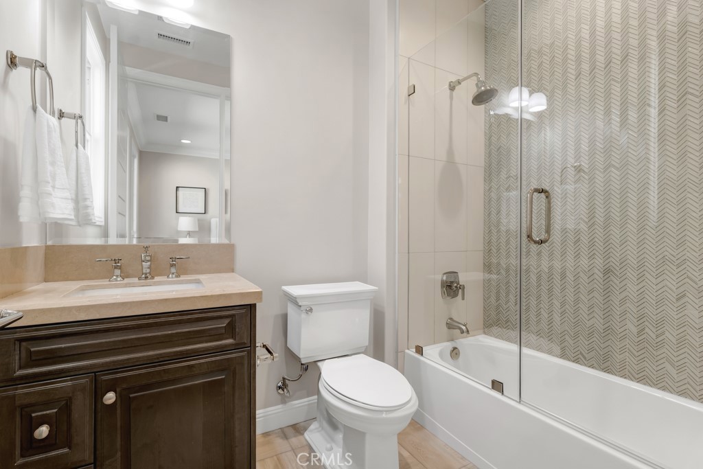 20120 Jubilee Way Porter Ranch, CA 91326 - Photo 50 of 55 a bathroom with a sink a toilet and shower