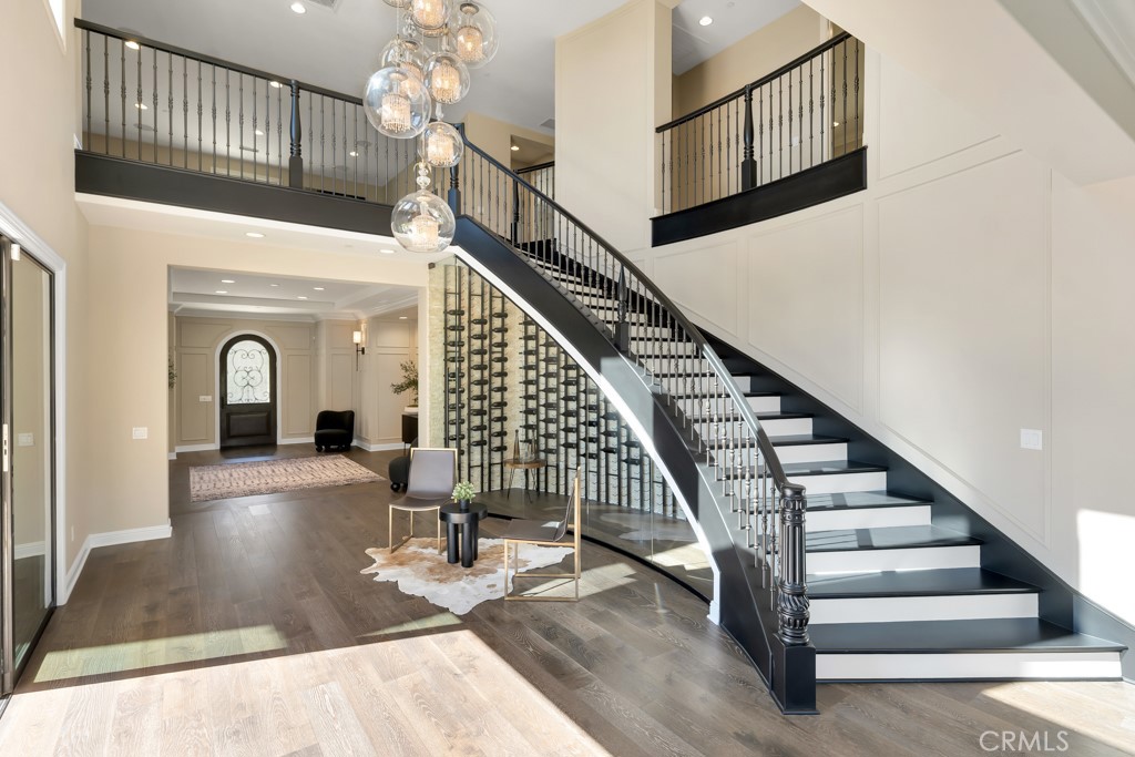 20120 Jubilee Way Porter Ranch, CA 91326 - Photo 8 of 55 a view of entryway and hall with wooden floor