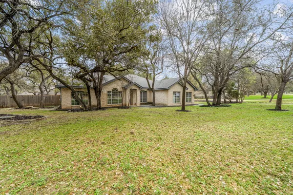 a house with huge green field
