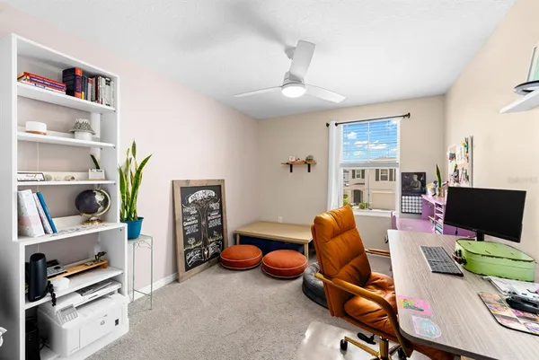 a room with furniture and a flat screen tv