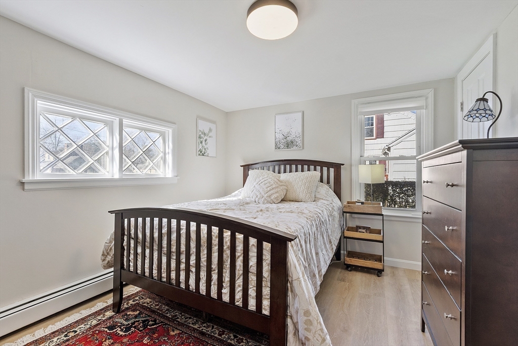 8 Bacon Street Oxford, MA 01540 - Photo 13 of 38 a bedroom with bed and wooden floor