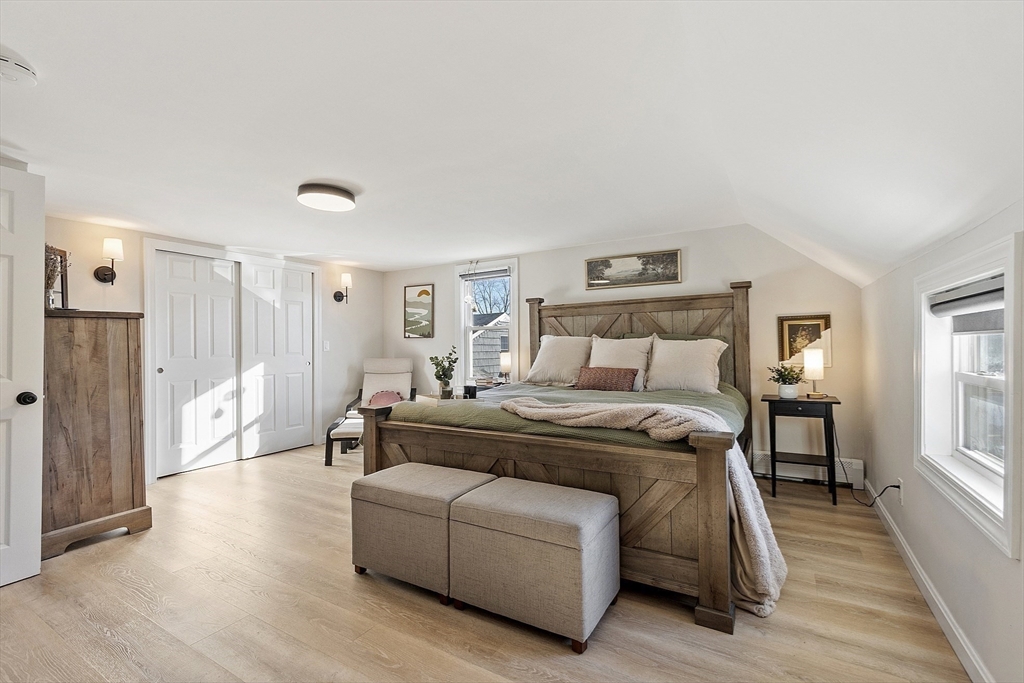 8 Bacon Street Oxford, MA 01540 - Photo 19 of 38 a bedroom with furniture and a wooden floor