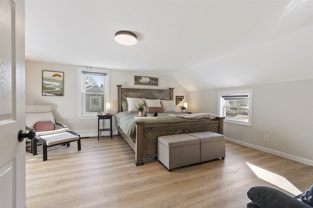 8 Bacon Street Oxford, MA 01540 - Photo 20 of 38 a bedroom with a bed and wooden floor
