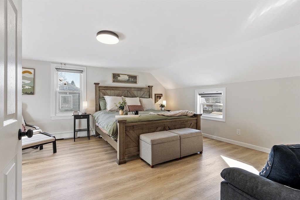 8 Bacon Street Oxford, MA 01540 - Photo 22 of 38 a bedroom with a bed and a couch