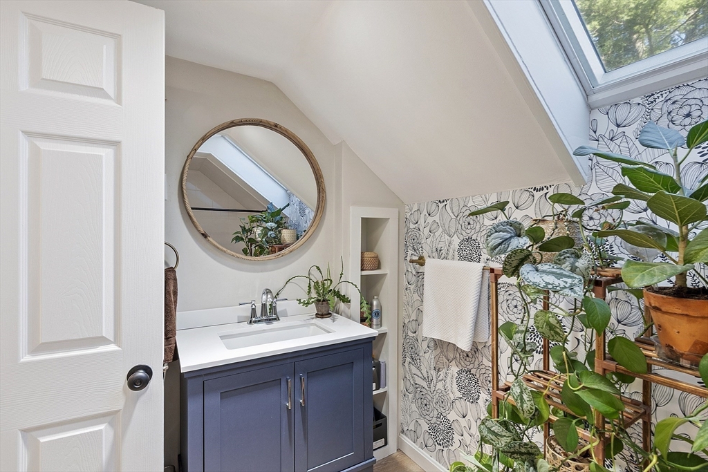 8 Bacon Street Oxford, MA 01540 - Photo 24 of 38 a bathroom with a sink and mirror