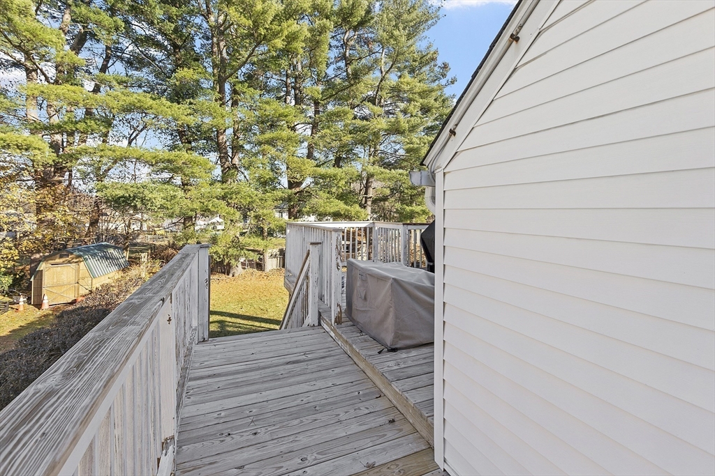 8 Bacon Street Oxford, MA 01540 - Photo 29 of 38 a view of a balcony with wooden floor and iron fence