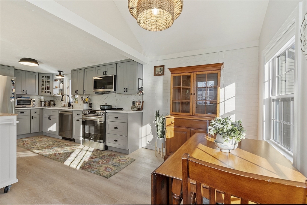 8 Bacon Street Oxford, MA 01540 - Photo 5 of 38 a kitchen with stainless steel appliances granite countertop a stove a sink and a refrigerator