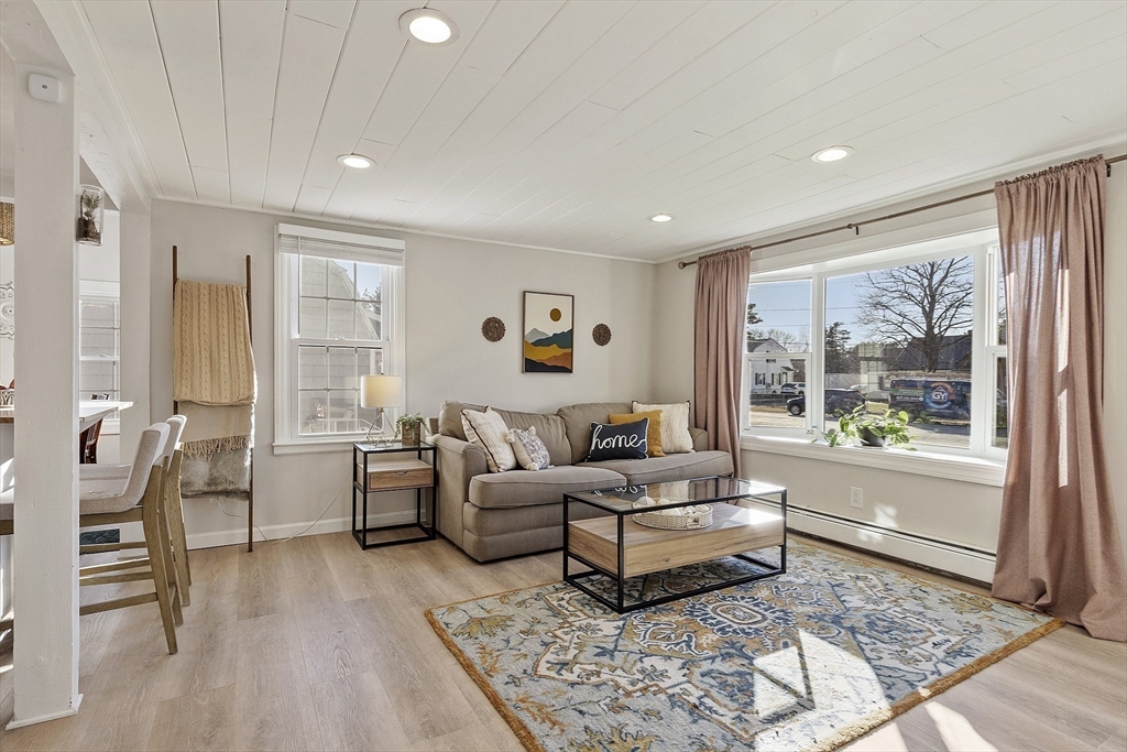 8 Bacon Street Oxford, MA 01540 - Photo 9 of 38 a living room with furniture and a large window