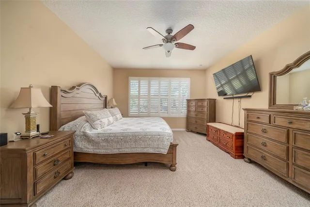 a bedroom with a bed and furniture