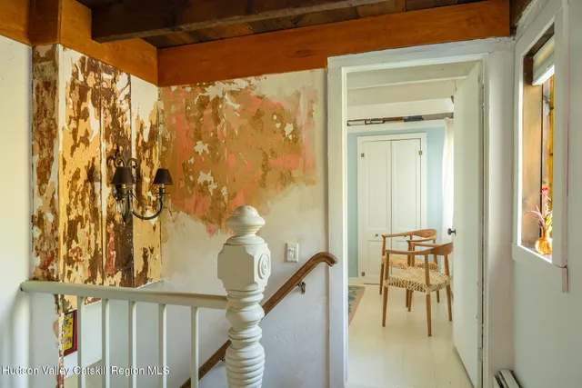 a view of balcony with furniture