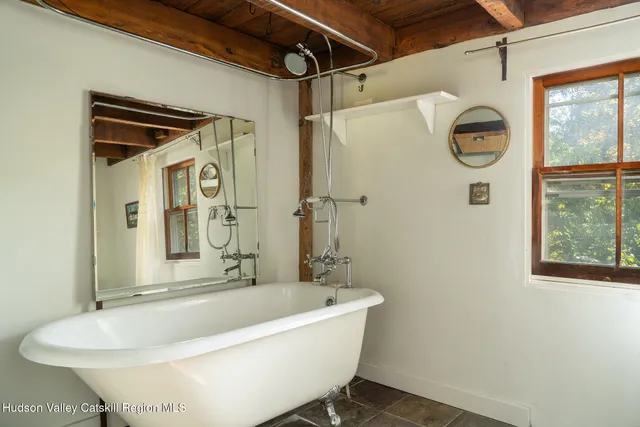 a bathroom with a sink and a bathtub