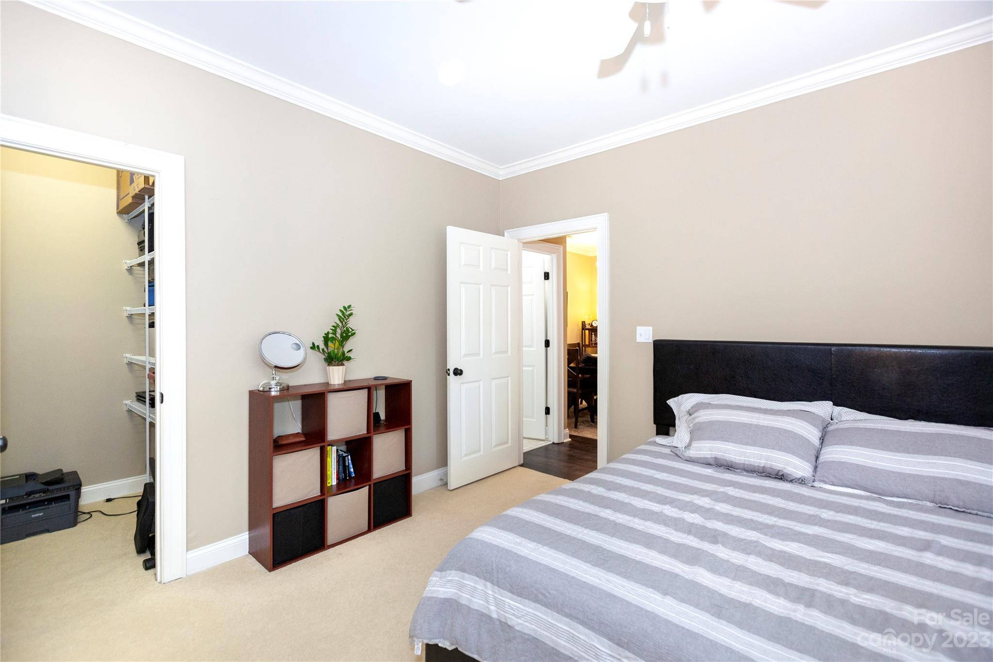 5601 Fairview Road, Unit 19 Charlotte, NC 28209 - Photo 21 of 30 a bedroom with a bed and a dresser