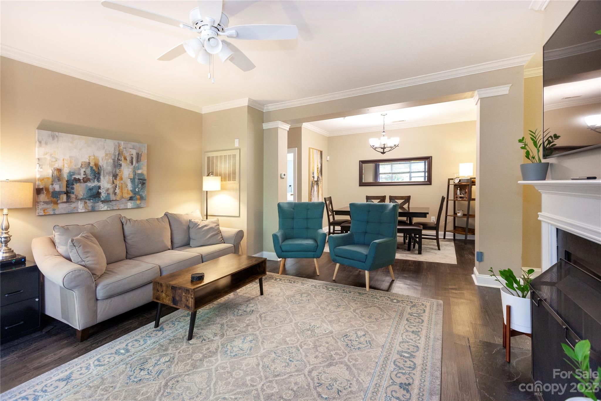 5601 Fairview Road, Unit 19 Charlotte, NC 28209 - Photo 4 of 30 a living room with furniture and a fireplace