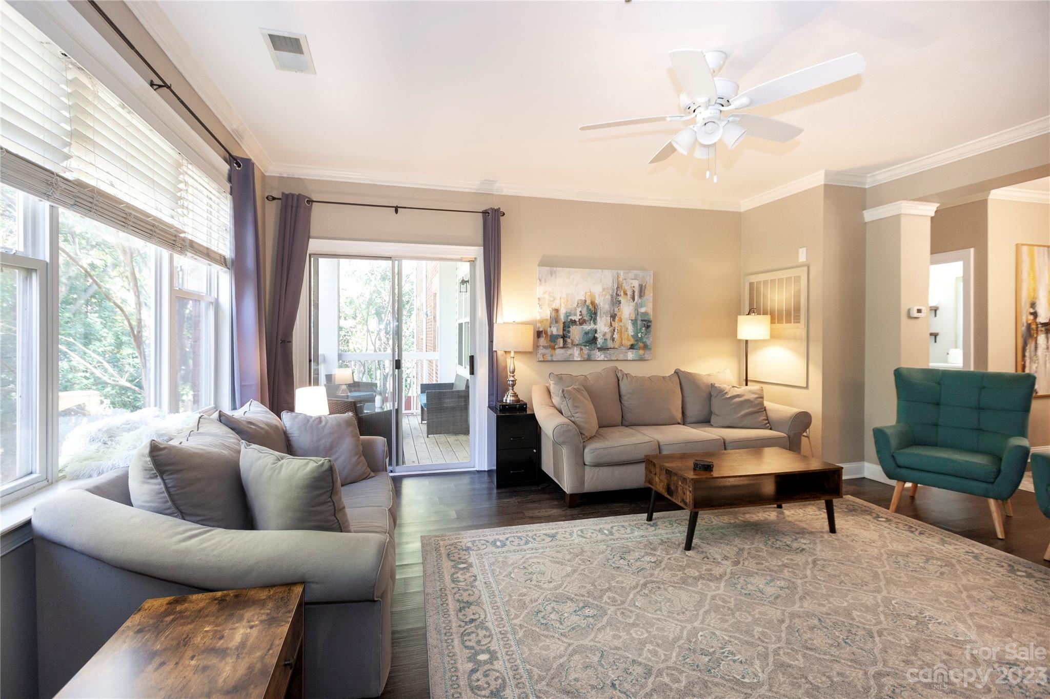 5601 Fairview Road, Unit 19 Charlotte, NC 28209 - Photo 5 of 30 a living room with furniture and a large window