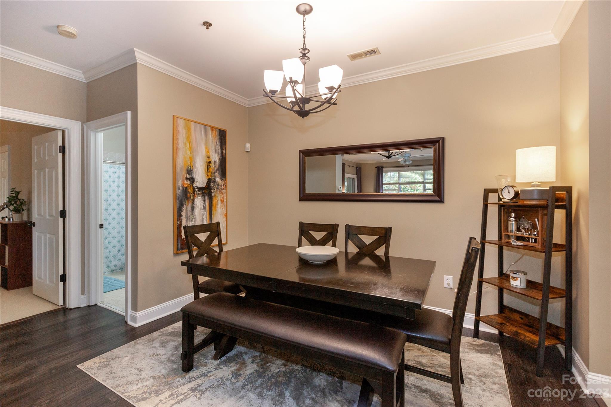 5601 Fairview Road, Unit 19 Charlotte, NC 28209 - Photo 7 of 30 a view of a dining room with furniture and wooden floor