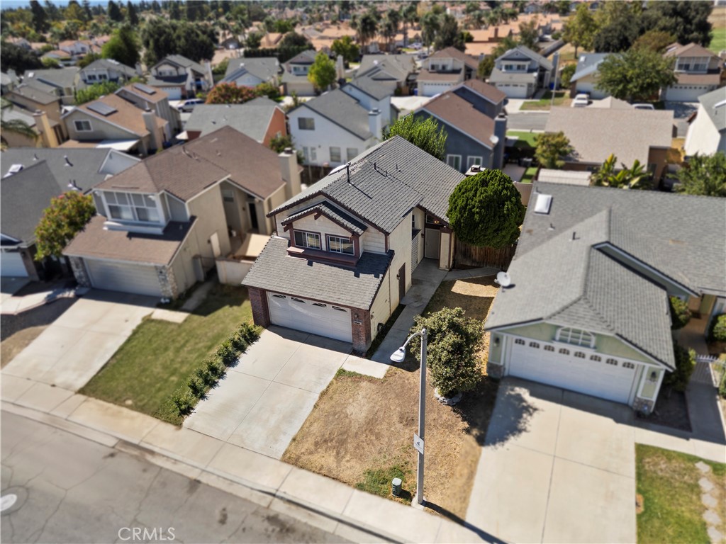 11840 Rustic Place Fontana, CA 92337 - Photo 17 of 20 an aerial view of a residential houses with outdoor space