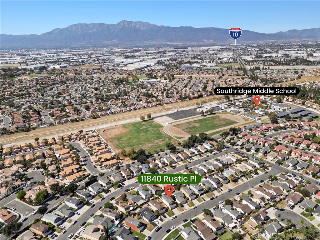 11840 Rustic Place Fontana, CA 92337 - Photo 19 of 20 an aerial view of residential houses and city view