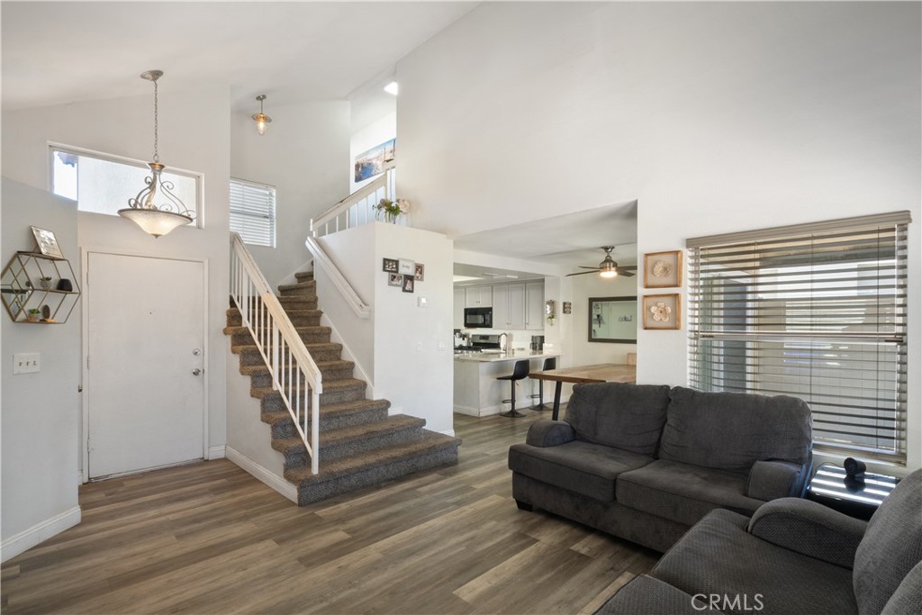 11840 Rustic Place Fontana, CA 92337 - Photo 3 of 20 a living room with furniture and wooden floor