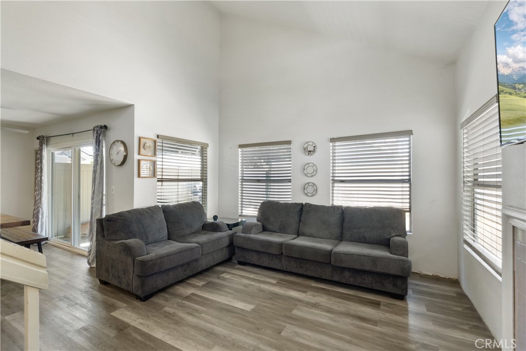11840 Rustic Place Fontana, CA 92337 - Photo 4 of 20 a living room with furniture and a large window