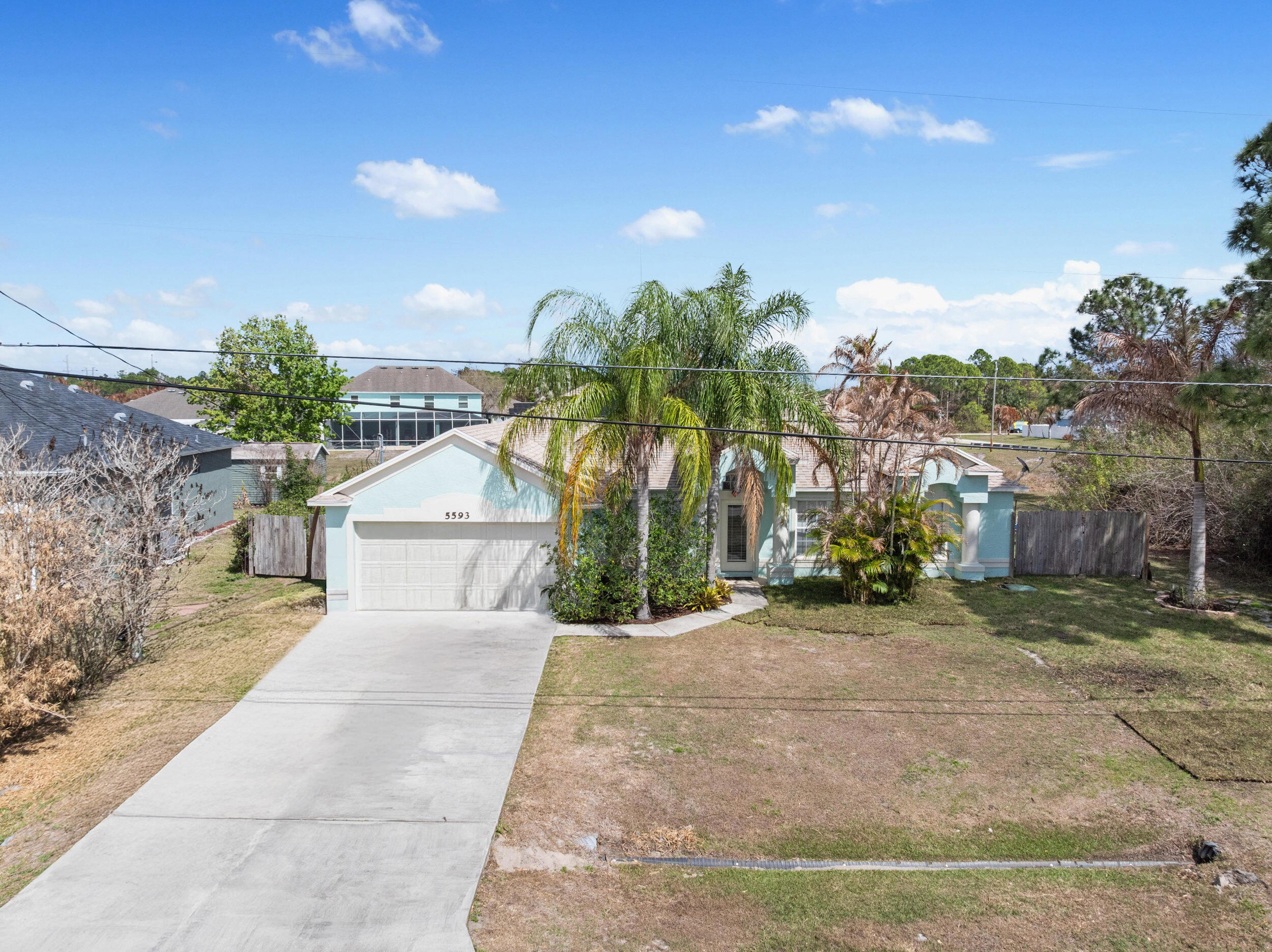 5593 Northwest Wesley Road Port St. Lucie, FL 34986 - Photo 3 of 33 Drone front exterior