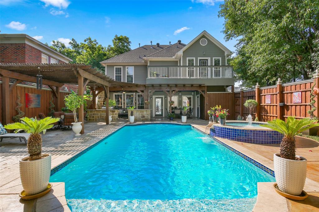 2829 Reagan Street Dallas, TX 75219 - Photo 1 of 1 a front view of a house with garden