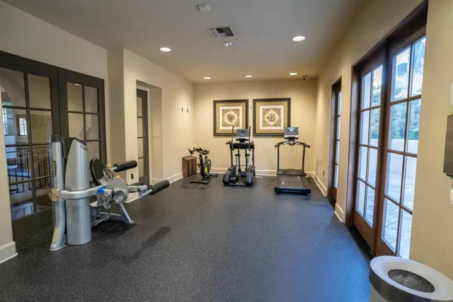 a view of a room with gym equipment