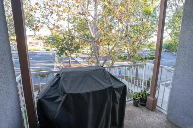 a view of balcony and wooden floor