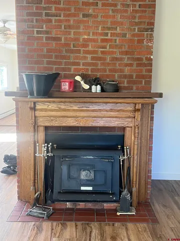 a fireplace with a clock on top of it