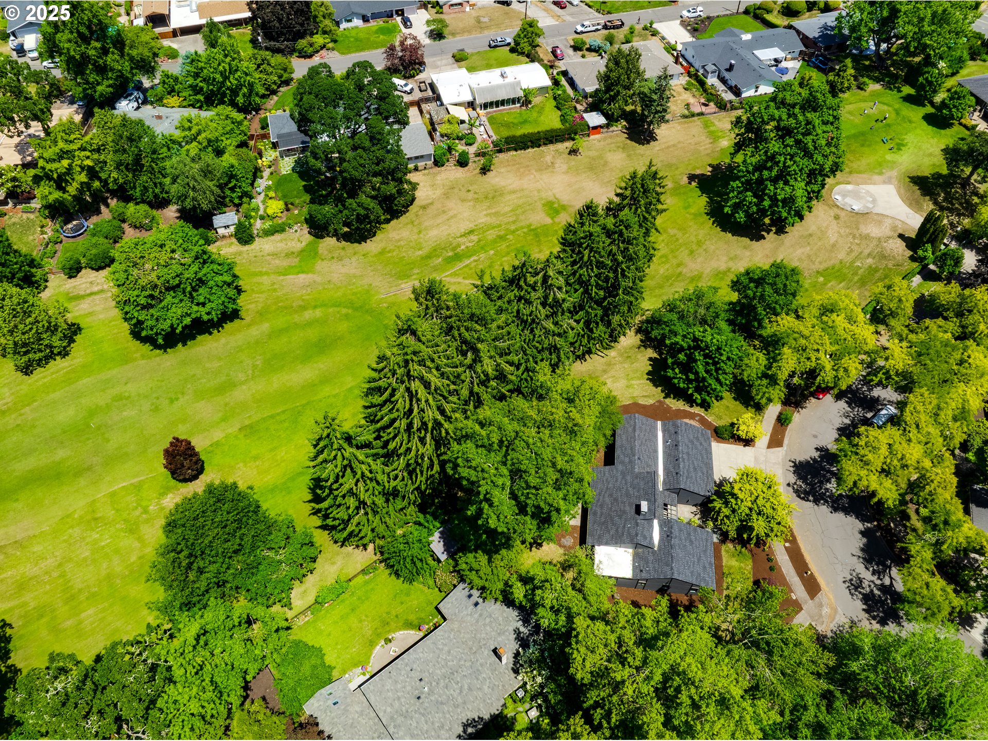 970 St Andrews Drive Eugene, OR 97401 - Photo 47 of 48 an aerial view of residential house with swimming pool and garden