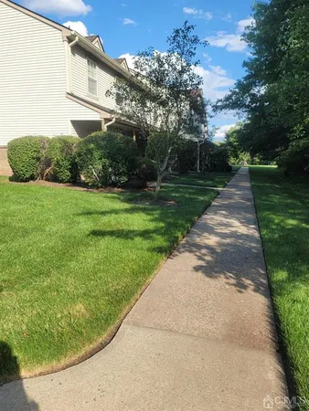 a view of a back yard of the house