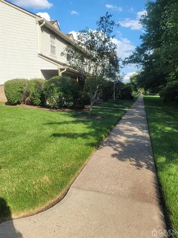 a view of a back yard of the house