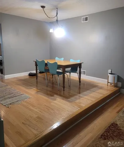 a view of a dining room with furniture