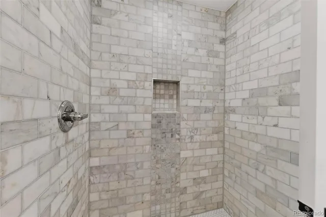 a view of a room with rack on the wall