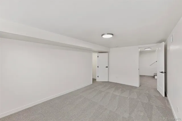 a view of a hallway with workspace