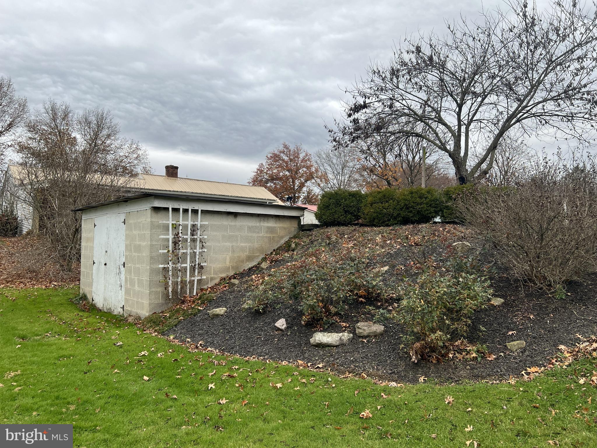 656 Snyder Avenue Beaver Springs, PA 17812 - Photo 31 of 39 a backyard of a house with lots of green space