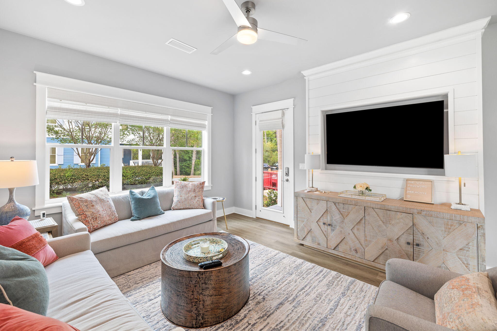 135 Redbud Ln Inlet Beach Inlet Beach, FL 32461 - Photo 11 of 66 a living room with furniture and a flat screen tv