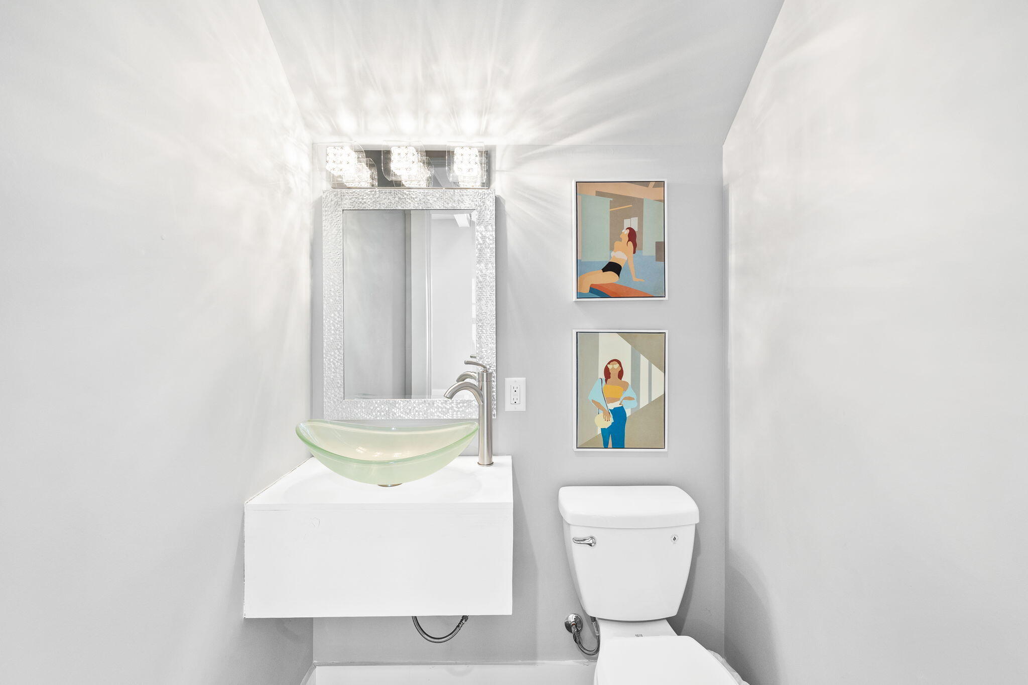 135 Redbud Ln Inlet Beach Inlet Beach, FL 32461 - Photo 14 of 66 a bathroom with a toilet sink and mirror