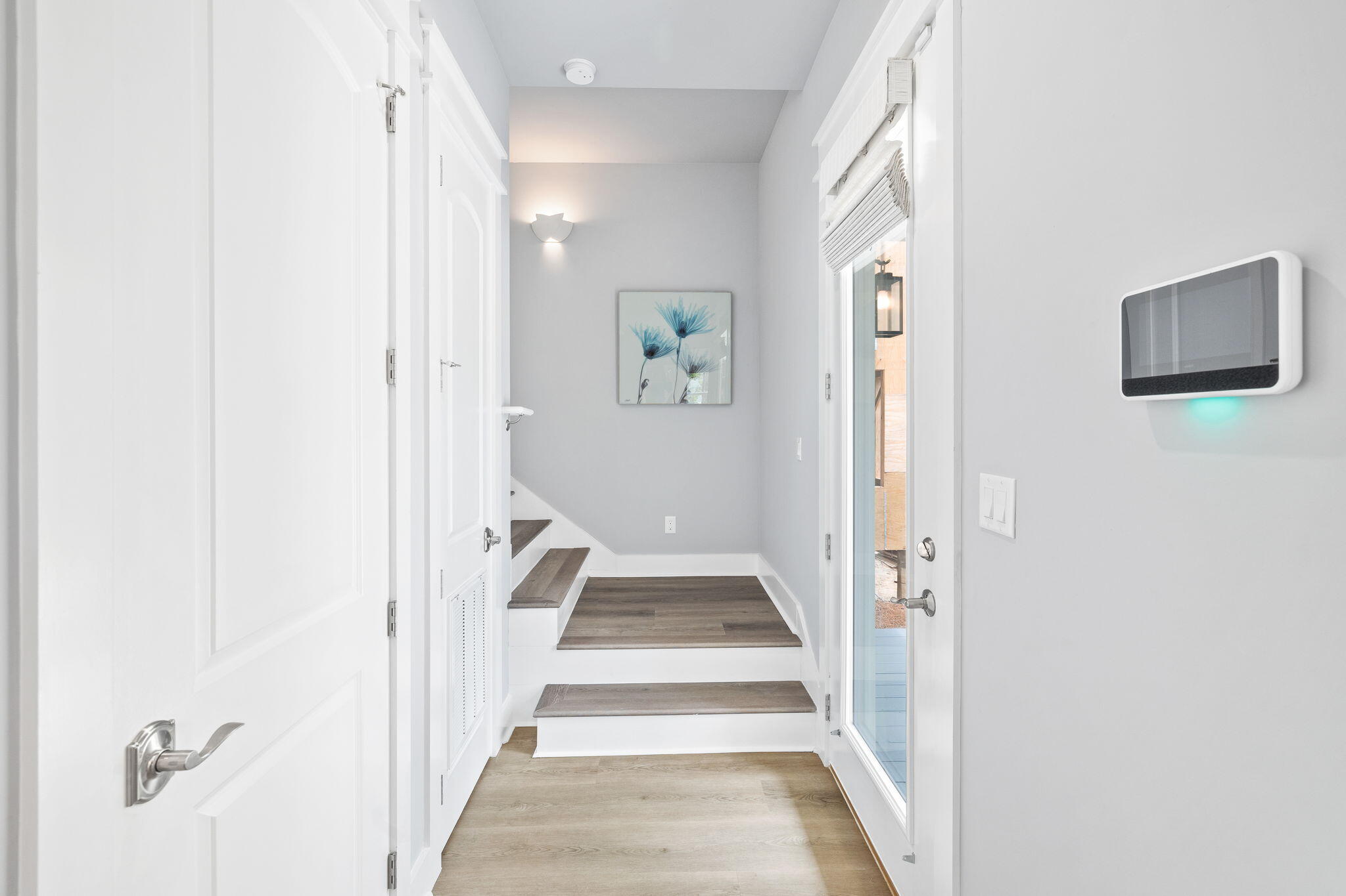 135 Redbud Ln Inlet Beach Inlet Beach, FL 32461 - Photo 21 of 66 a view of a hallway with wooden floor and entryway