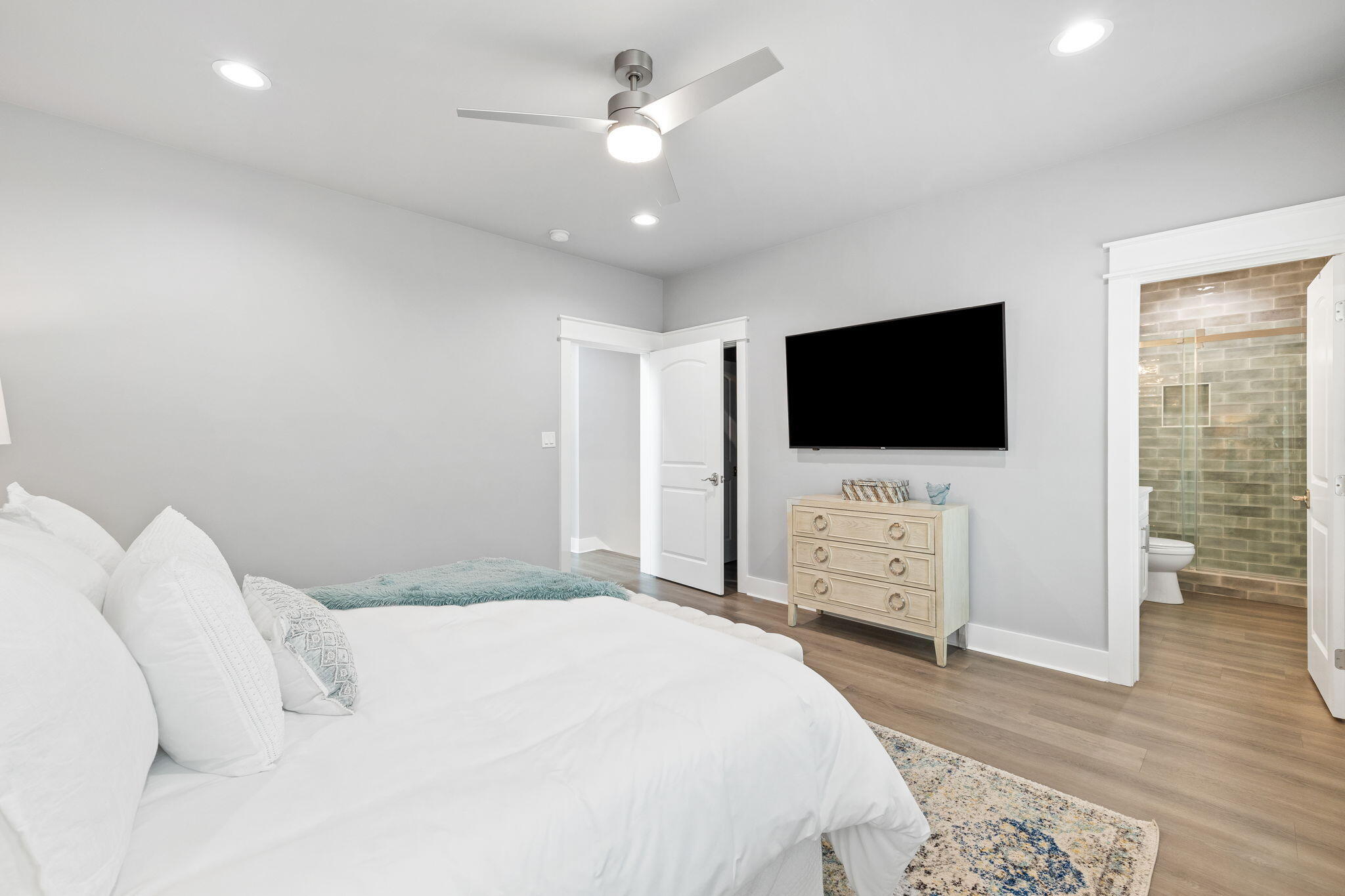 135 Redbud Ln Inlet Beach Inlet Beach, FL 32461 - Photo 23 of 66 a bedroom with a bed tv on table and flat screen tv