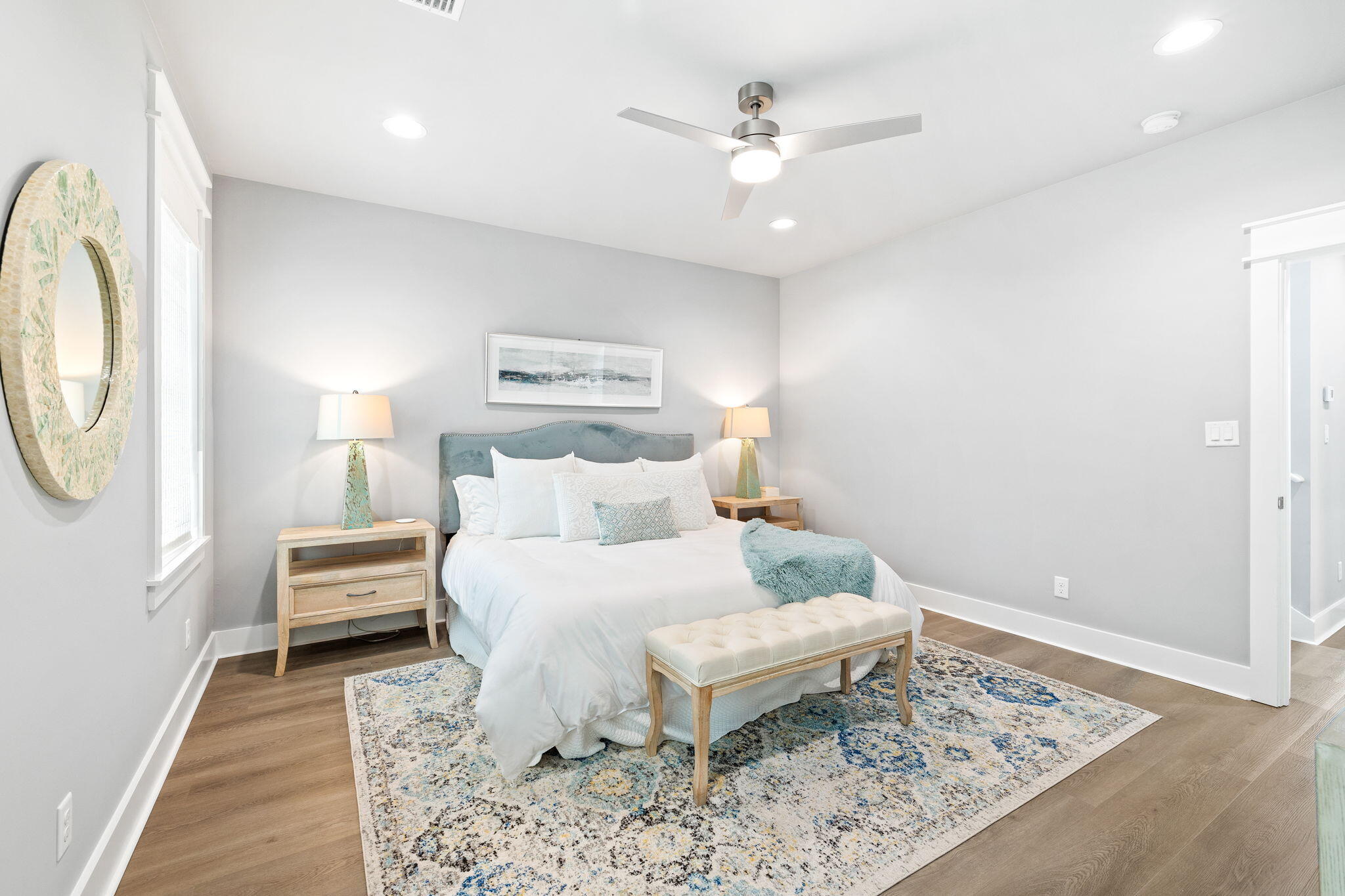 135 Redbud Ln Inlet Beach Inlet Beach, FL 32461 - Photo 24 of 66 a bedroom with a bed and a chandelier