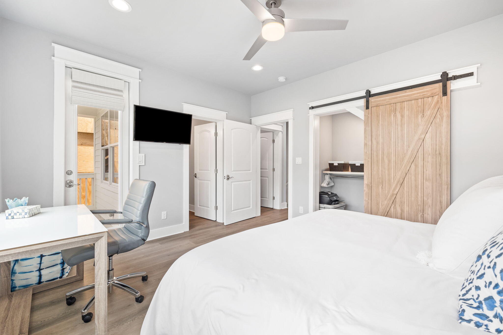 135 Redbud Ln Inlet Beach Inlet Beach, FL 32461 - Photo 31 of 66 a spacious bedroom with a bed and a table