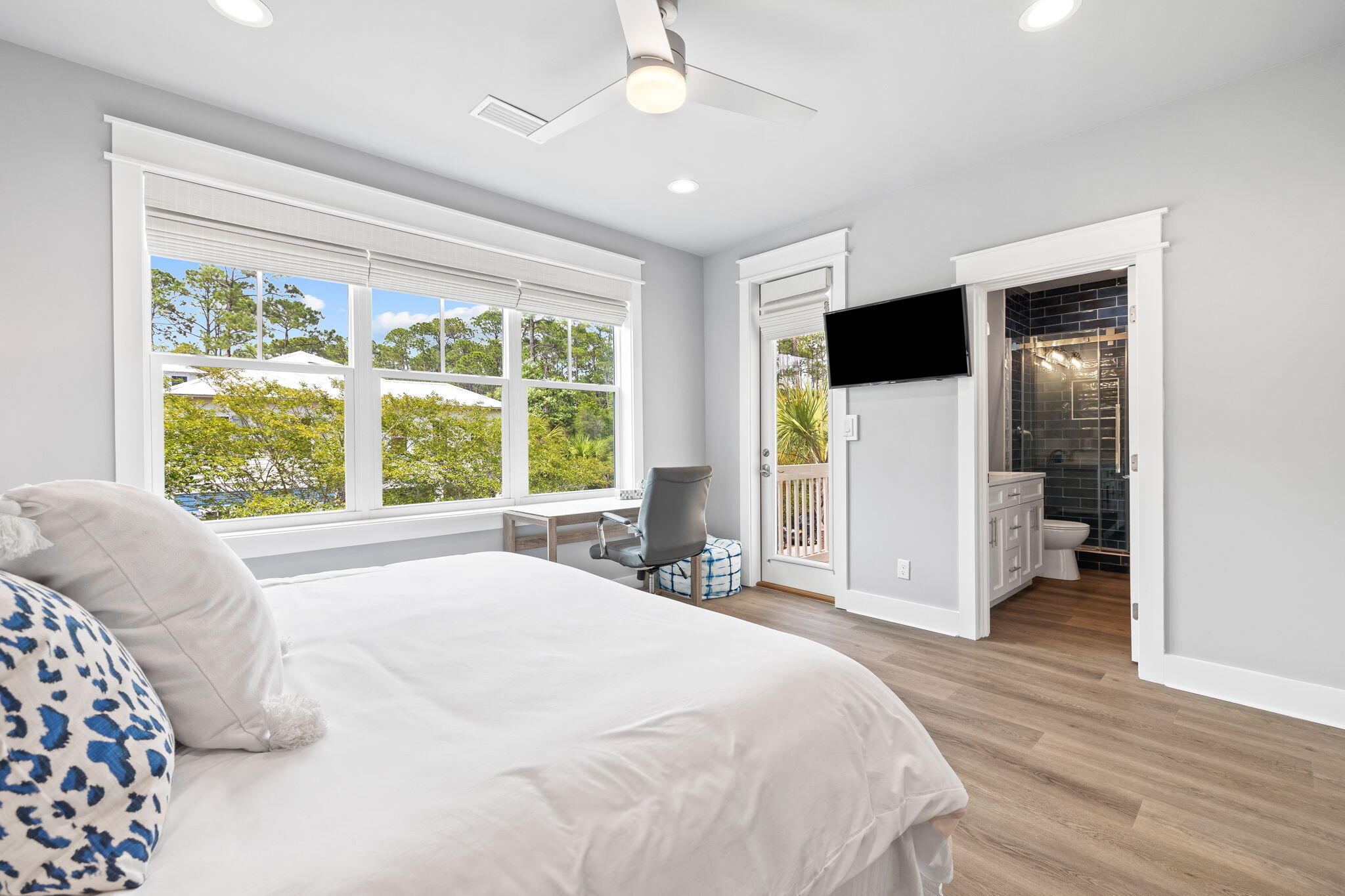 135 Redbud Ln Inlet Beach Inlet Beach, FL 32461 - Photo 32 of 66 a spacious bedroom with a bed and a large window