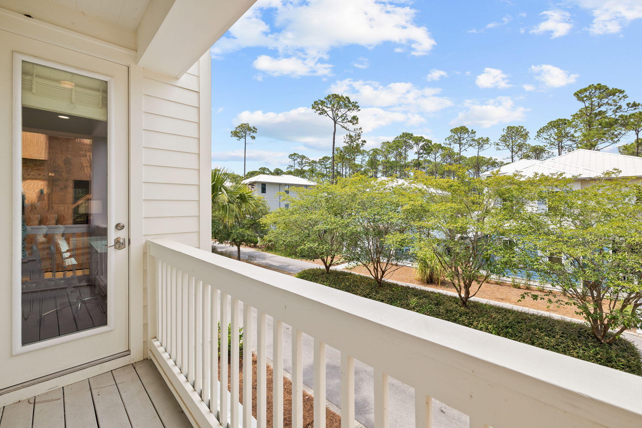 135 Redbud Ln Inlet Beach Inlet Beach, FL 32461 - Photo 35 of 66 a view of a balcony with an outdoor space