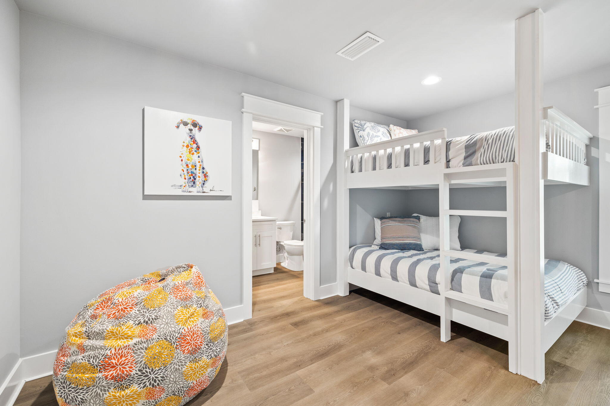 135 Redbud Ln Inlet Beach Inlet Beach, FL 32461 - Photo 39 of 66 a bedroom with a bed and wooden floor