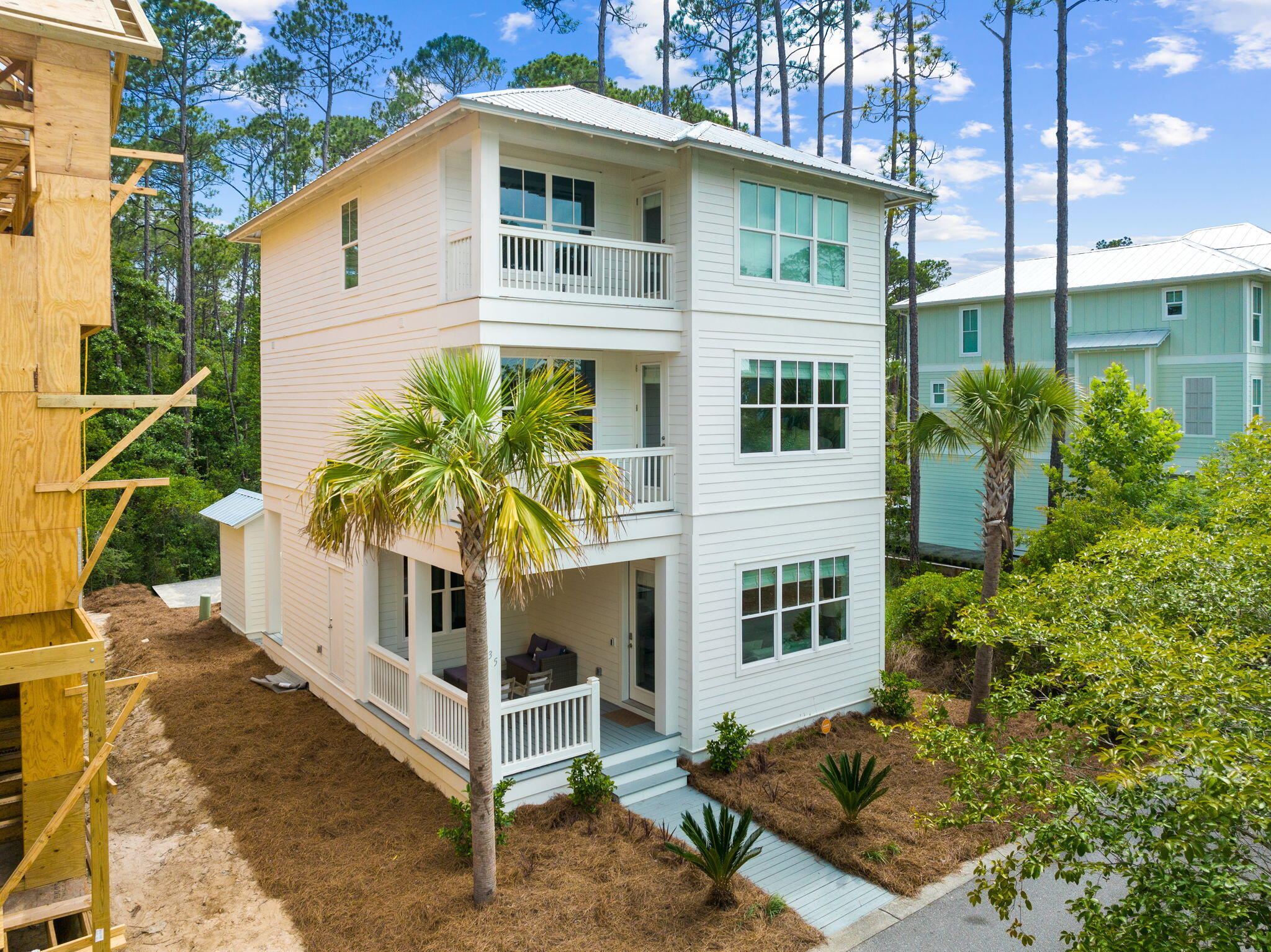 135 Redbud Ln Inlet Beach Inlet Beach, FL 32461 - Photo 64 of 66 a front view of a house with a yard