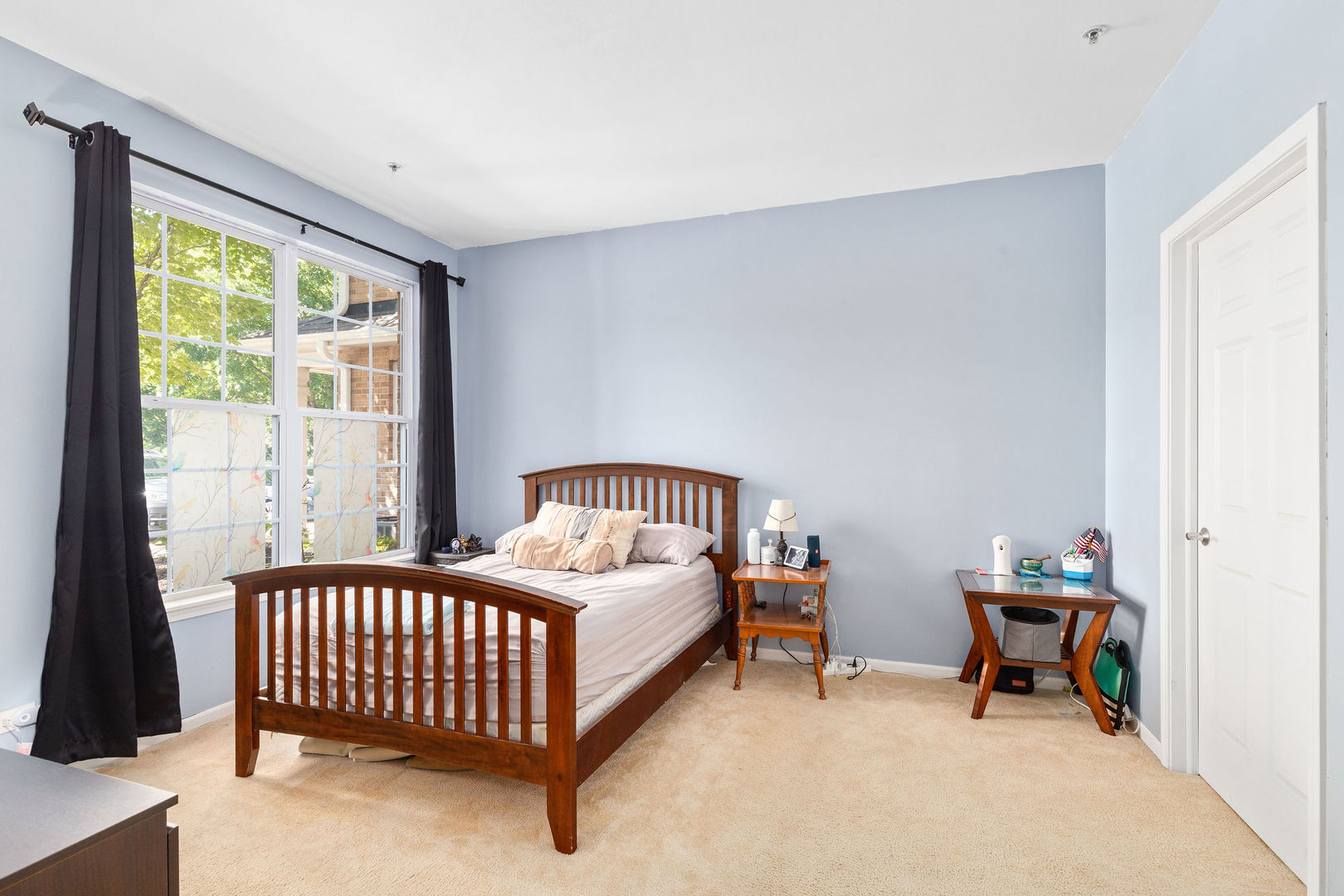 4486 Timber Ridge Court, Unit 4486 Joliet, IL 60431 - Photo 11 of 22 a bed room with a bed and a window