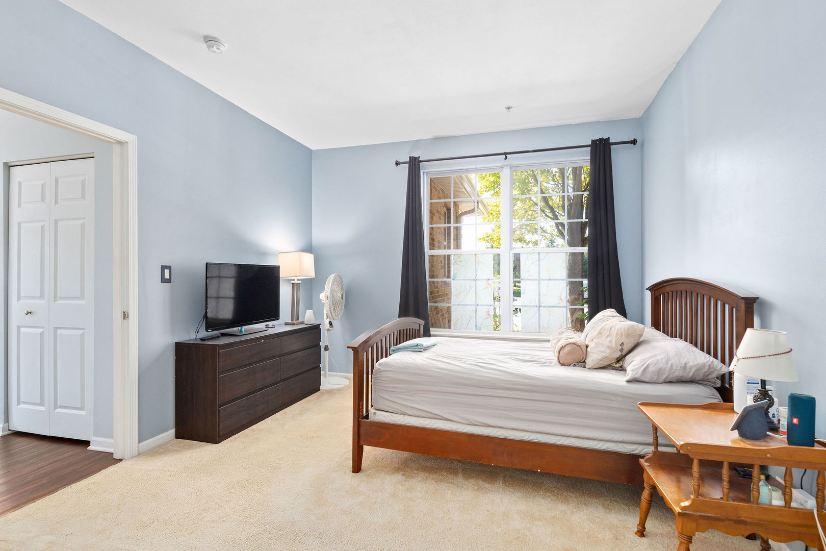 4486 Timber Ridge Court, Unit 4486 Joliet, IL 60431 - Photo 12 of 22 a bedroom with a bed and a television
