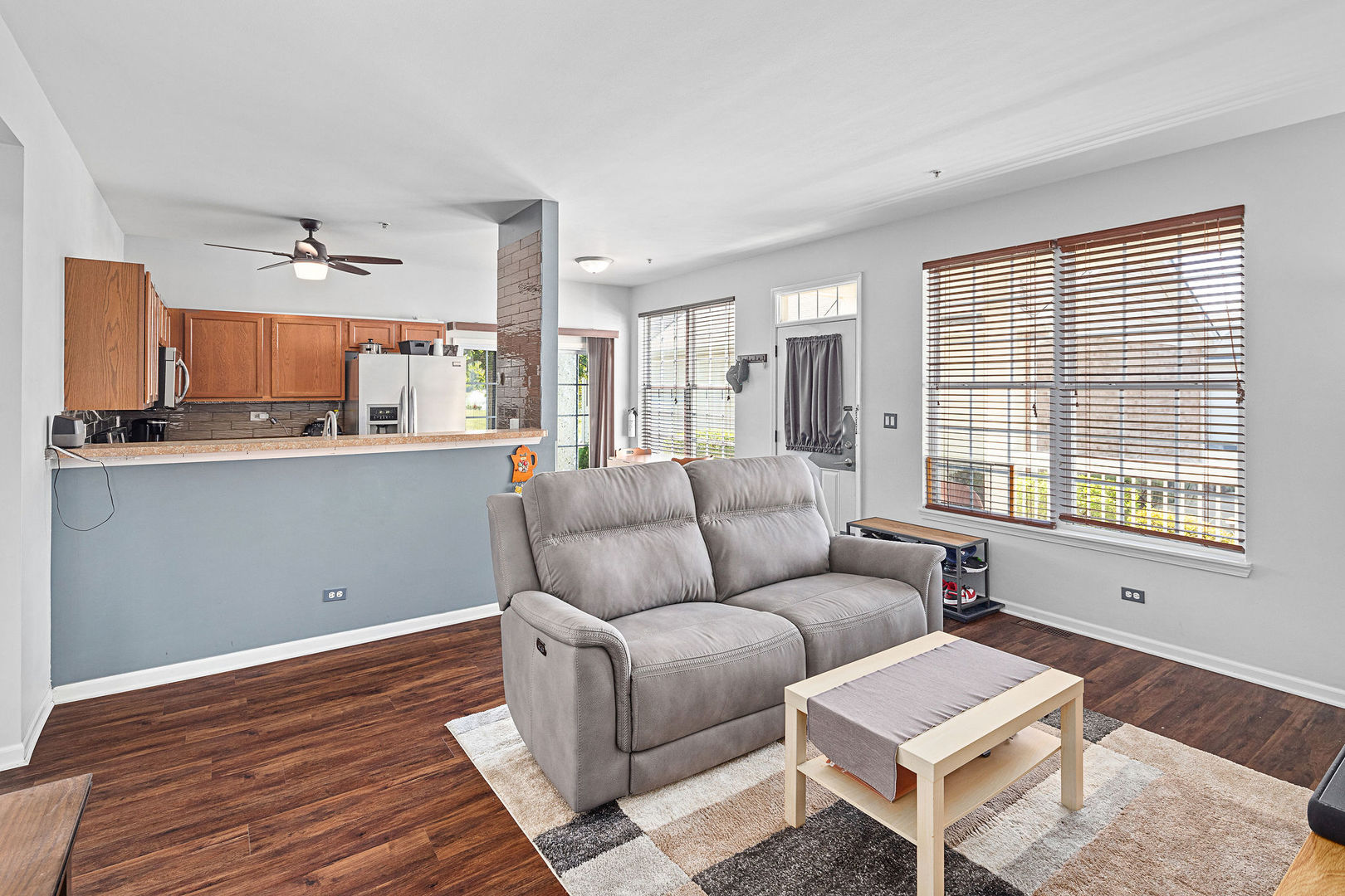 4486 Timber Ridge Court, Unit 4486 Joliet, IL 60431 - Photo 10 of 22 a living room with furniture and a window